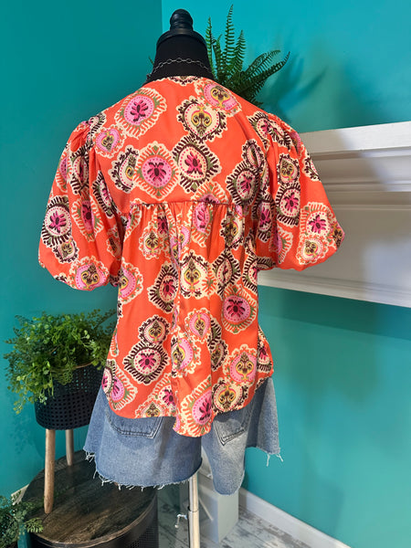 The Puff Sleeve Tassel Top