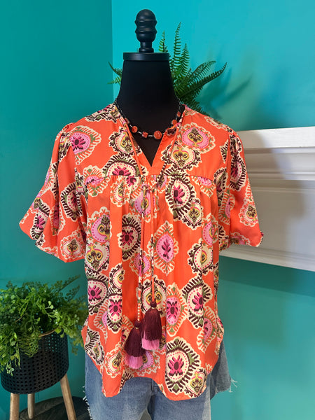 The Puff Sleeve Tassel Top