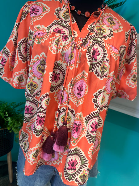 The Puff Sleeve Tassel Top