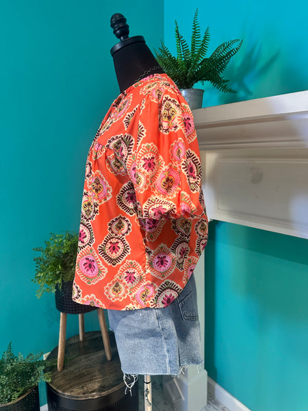 The Puff Sleeve Tassel Top