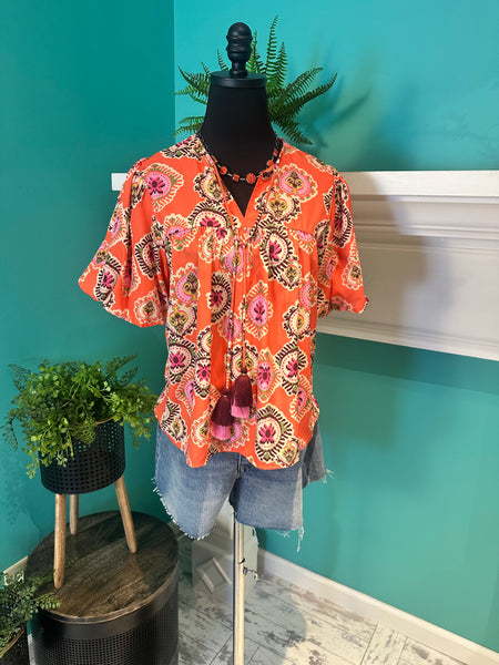 The Puff Sleeve Tassel Top