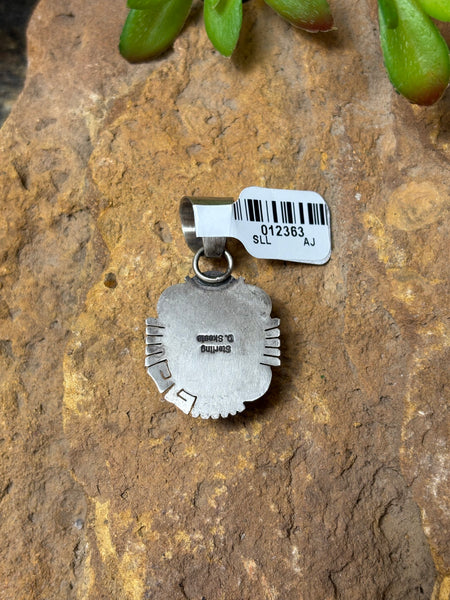 Turquoise Pendant with Silver Detail